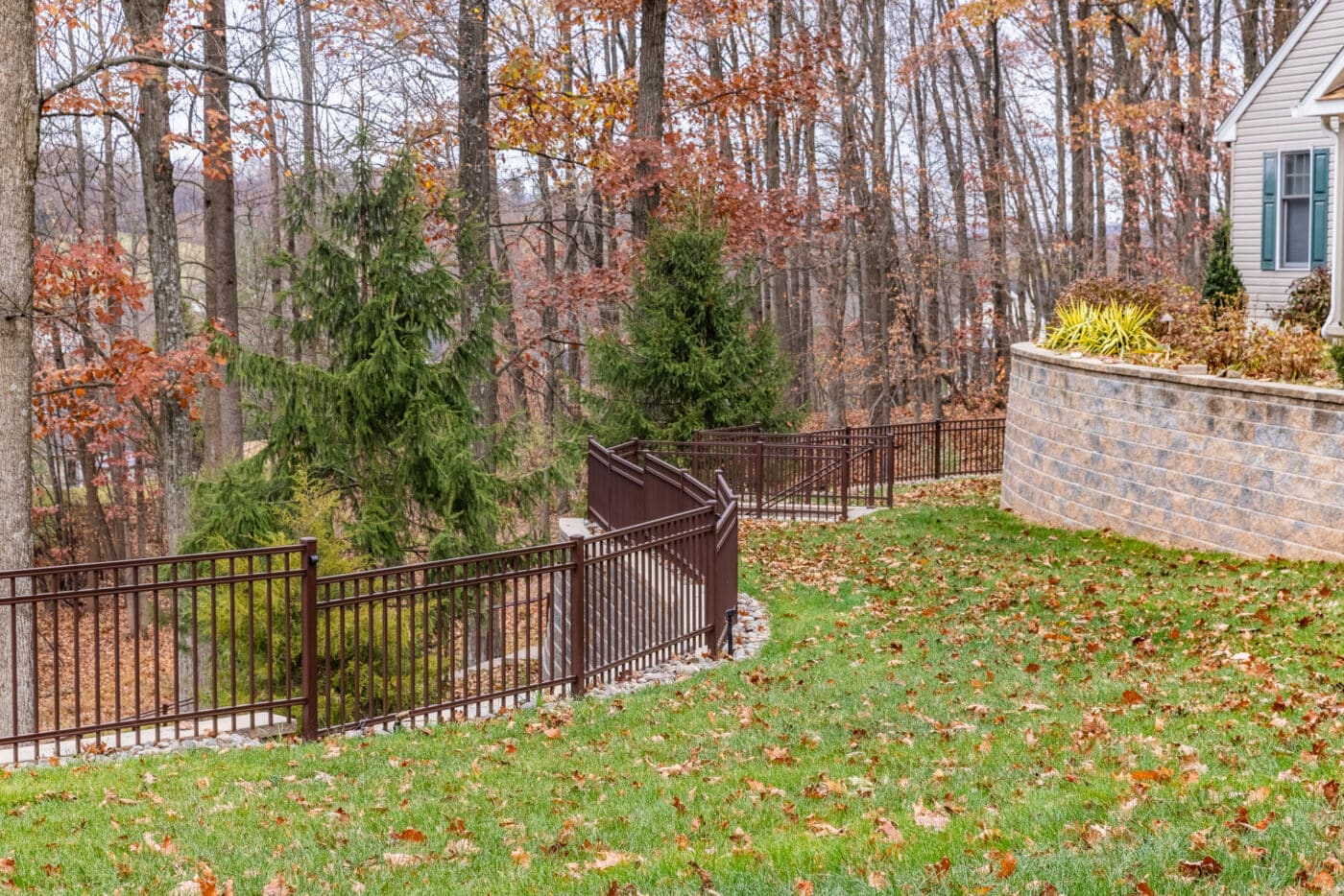 backyard view of a new retaining wall in Robeson