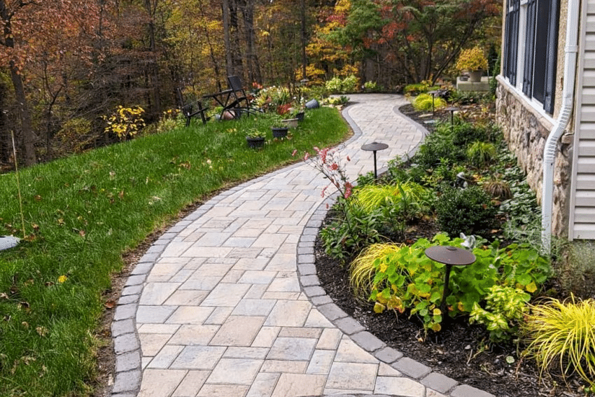 concrete walkway with landscape maintenance