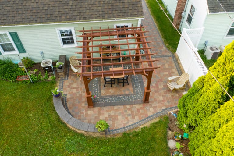 aerial shot of concrete patio with pergola 1596804319