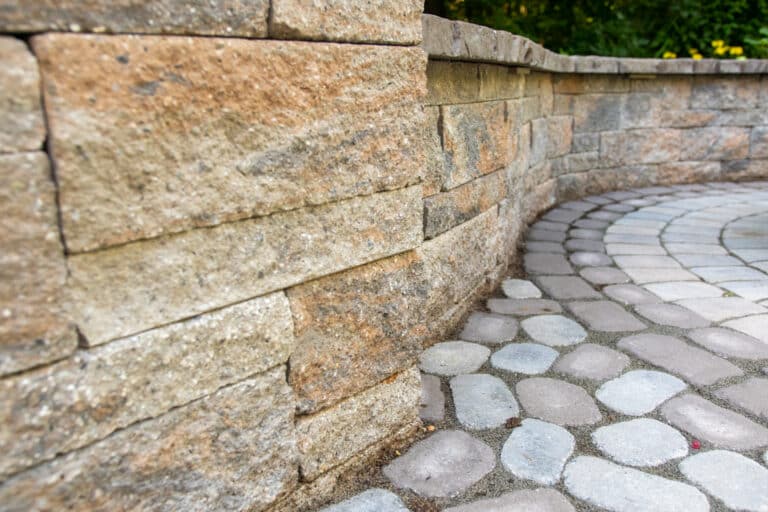 concrete walkway with block walls