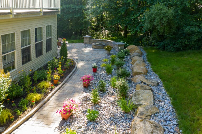 concrete walkway with rocks