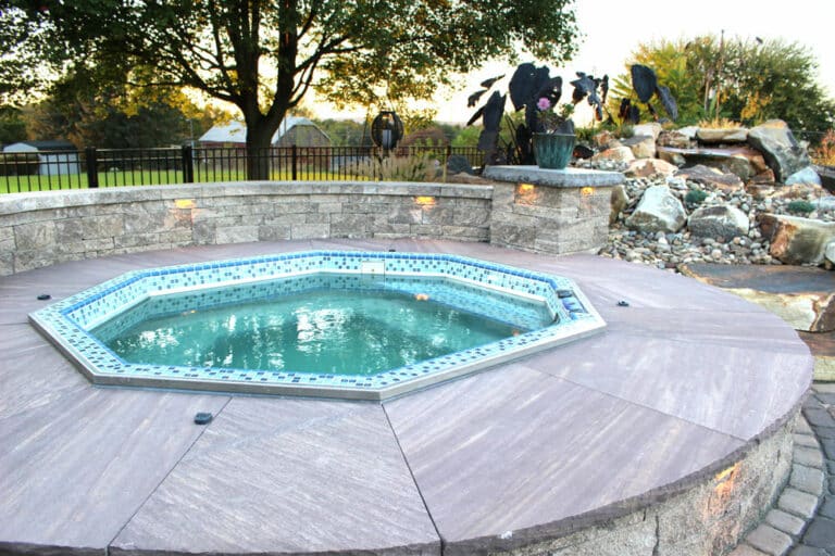 poolside patio spa and waterfall
