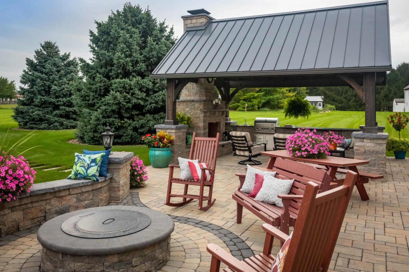 fire pit with pavilion behind it
