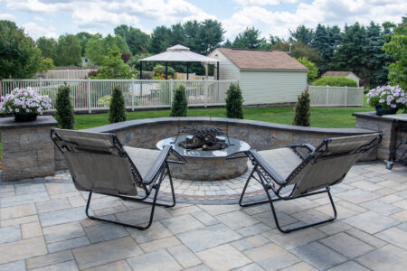 backyard paver patio with fire pit